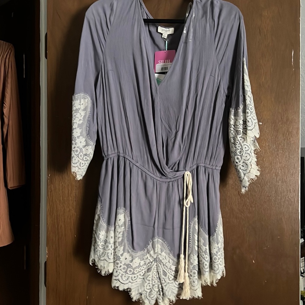 NWT surplice lace hem romper w/ tassel waist tie